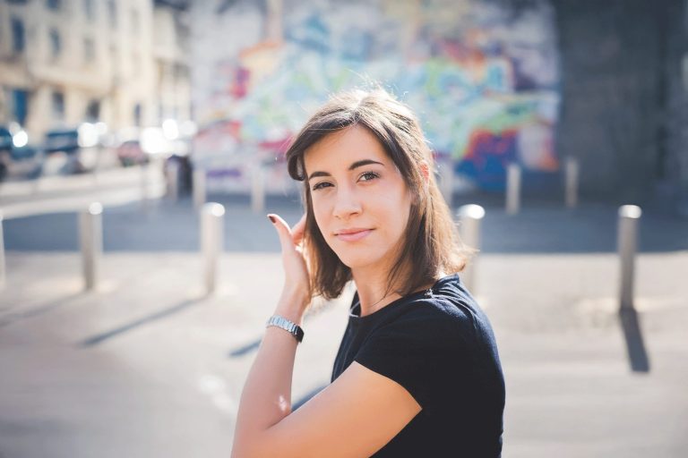 confident young woman looking at the camera